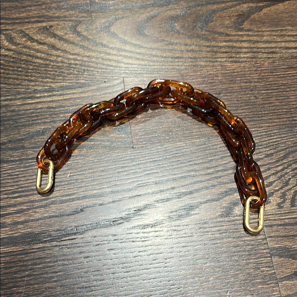 Clare V, resin tortoise color short strap